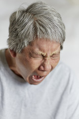 Obraz premium Adult Male Yawning with shallow depth of field