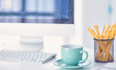 A cup of coffee on the office table