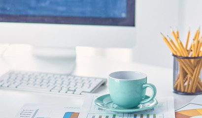 A cup of coffee on the office table