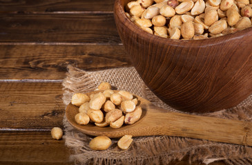 Dry Roasted Peanuts on a Wooden Spoon