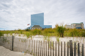 Sand dunes and modern building in Atlantic City, New Jersey.