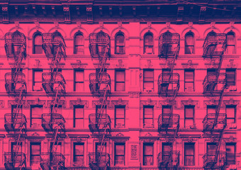 Old building in the Lower East Side of Manhattan, New York City with pink and blue color cast effect