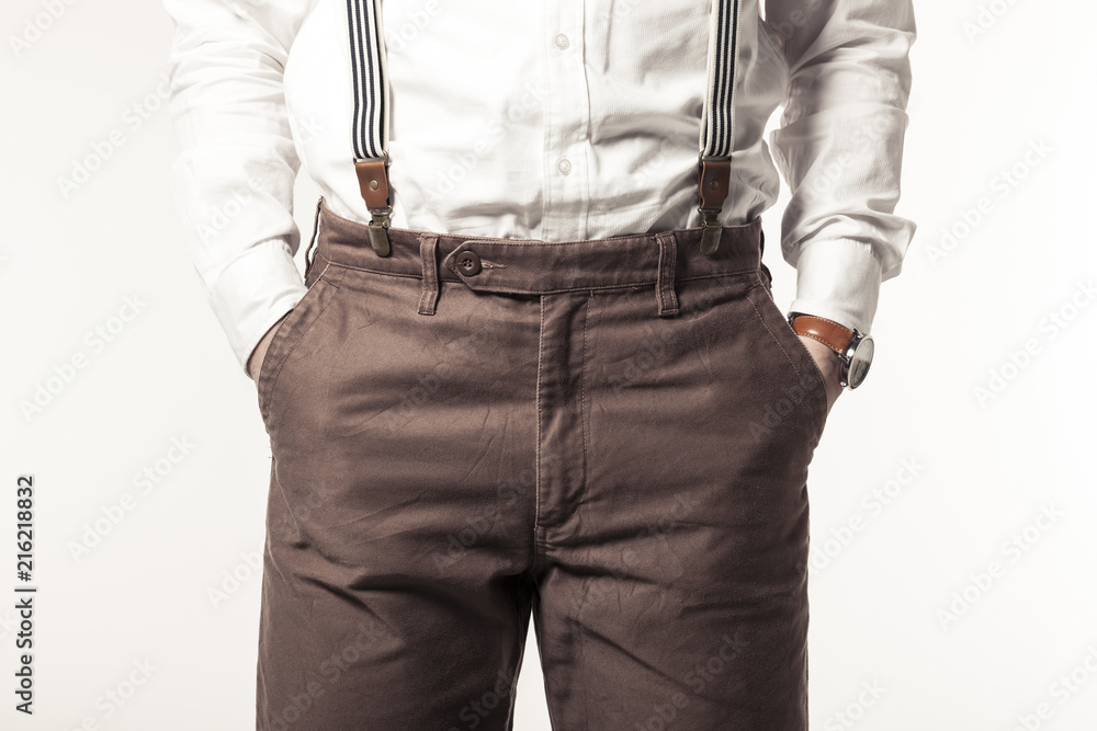 Wall mural man wearing brown clothes isolated white.