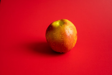 Nectarine on red background
