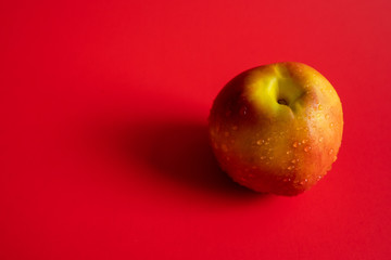 Nectarine on red background
