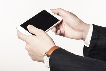 business man hand hold a mobile phone on the white background.