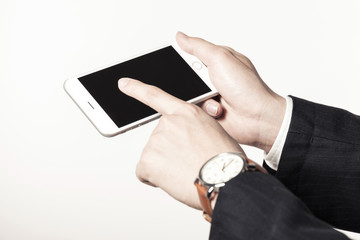 business man hand hold a mobile phone on the white background.
