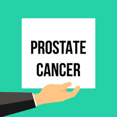 Man showing paper PROSTATE CANCER text