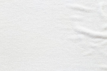 Obraz premium White towel texture background with abstract pattern. That fabric or textile consist of cotton fiber or natural material. For absorb water, drying and wiping in bathroom, laundry and kitchen room.