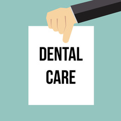Man showing paper DENTAL CARE text