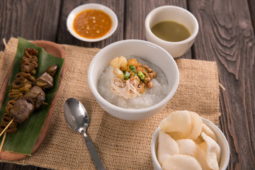bubur ayam. chicken porridge with soup