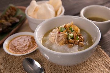 bubur ayam. chicken porridge with soup