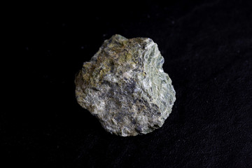 Tale stone isolate on black background
