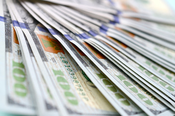 Macro shot with shallow depth of field. Hundred US dollar bills