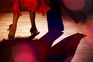 Man and a woman dancing Salsa