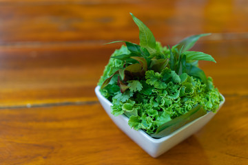 vegetables in cup on table