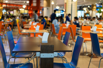 Tables and chairs on food court