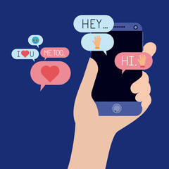 hand with smartphone and set speech bubbles and emoticons