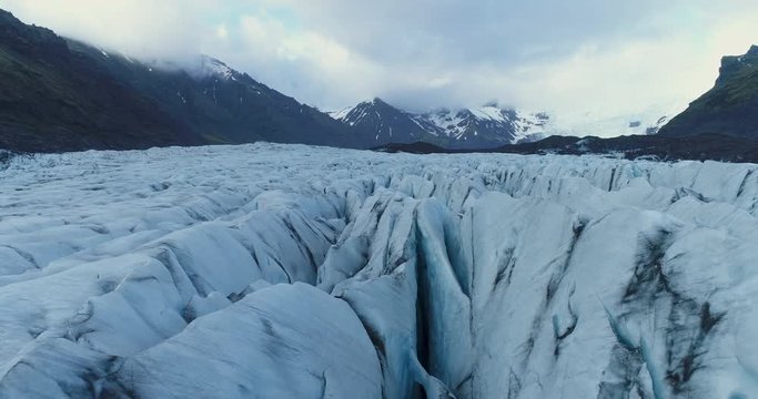 Slow moving aerial of exotic glacier field in Iceland