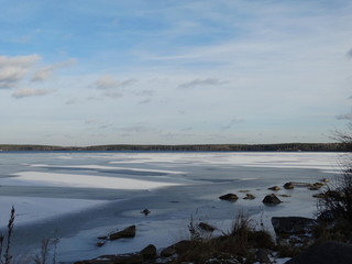 Naklejka premium First ice on the lake. Shartash lake, Ekaterinburg, Russia