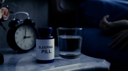 Senior woman take sleeping pill