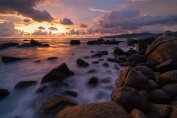Fototapeta na wymiar landscape long exposure Sunset beach and sea rock