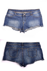 Blue denim shorts on white background.