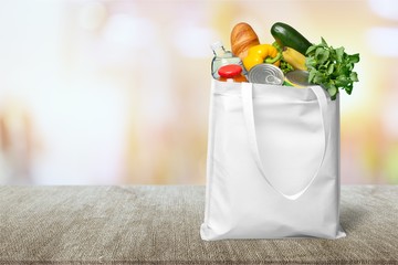 Full shopping  bag on desk