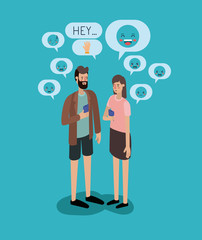 couple chating with smartphone and set speech bubbles and emoticons
