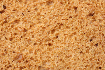 Whole grain bread texture background. macro. top view