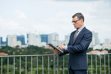Businessman with digital tablet