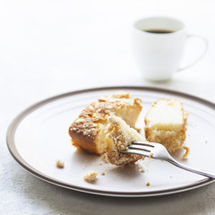 Cup of aromatic coffee and biscuit cake for breakfast on table