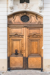 Fototapeta premium Paris, old wooden door on the ile de la Cite, beautiful entry porch 