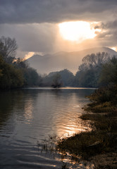colorful countryside landscape sunset in bad weather