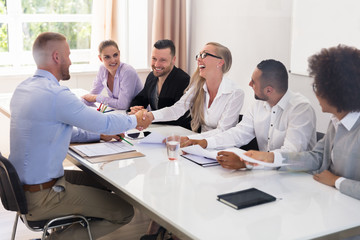 Businessman Shaking Hands At Interview