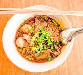  blood soup noodle. Boat noodles is a Thai style noodle dish, which has a strong flavor. It contains both pork and beef, as well as Dark soy sauce, Pickled bean curd and some other spices.