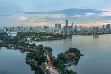 Fototapeta premium Aerial view of Hanoi skyline at West Lake or Ho Tay. Hanoi cityscape at twilight