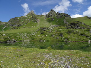 The Grunwaldsee in Obertauern near Hochalm and Seekarspitze. Austria