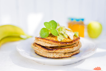 Useful punkcakes with honey and fruits