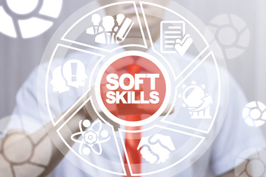 Manager (businessman) clicks a soft skills words button on a virtual panel. Soft skills training and improvement concept. Human Resource Management and Training.