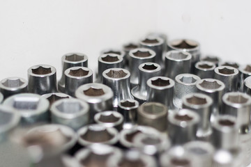 Automotive screw-nut on white background
