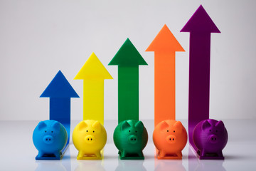 Multi Colored Piggybanks And Increasing Arrows