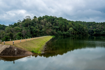 Obraz premium The Dam in the valley with walkway for camping, Pang-Ung Lake in the North (Mae Hong Son) of Thailand