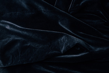 top view of black velvet textile as background