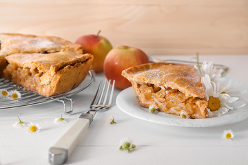 Delicious apple pie on table