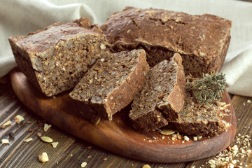 baked bread on wooden table background