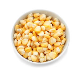 Bowl with ripe corn kernels on white background