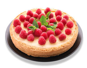 Delicious cheesecake with raspberries on white background