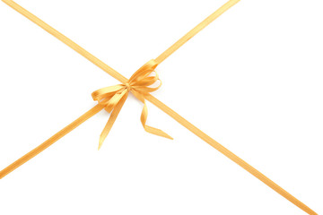 Golden ribbons with bow on white background