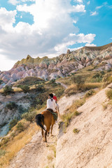 horse riding Cappadocia, woman horse riding Kapadokya Turkey